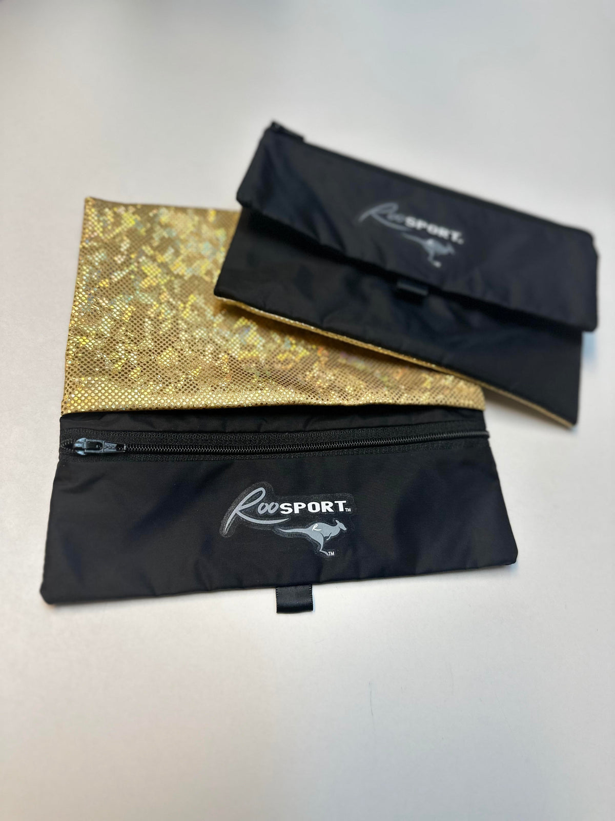 RooSport Large Gold Sparkle magnetic phone pocket, front view