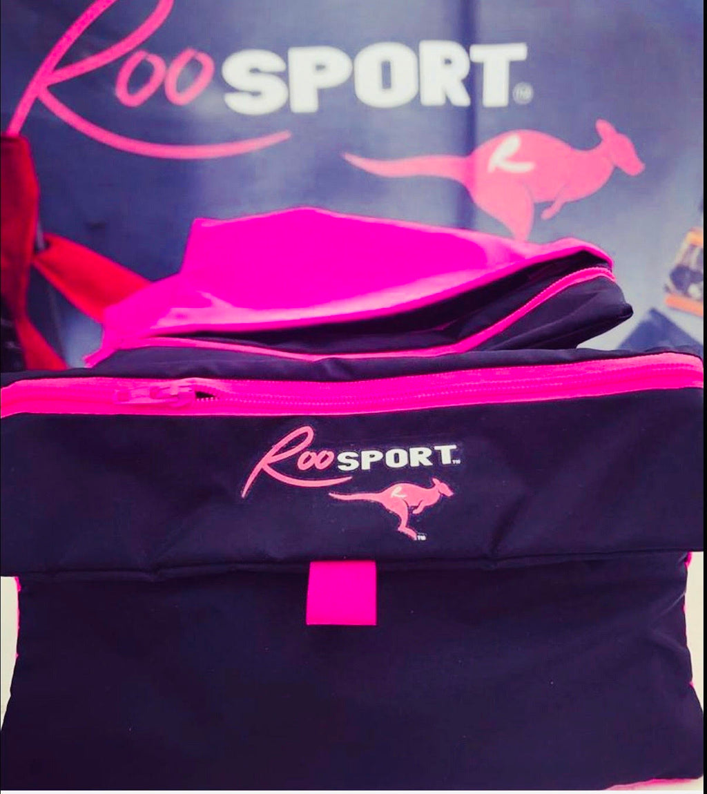 Stack of pink RooSport magnetic pockets
